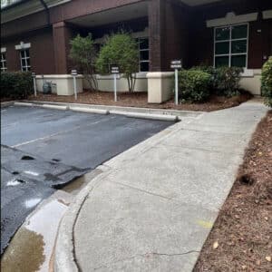 clean concrete sidewalk after pressure washing service in sugar hill georgia